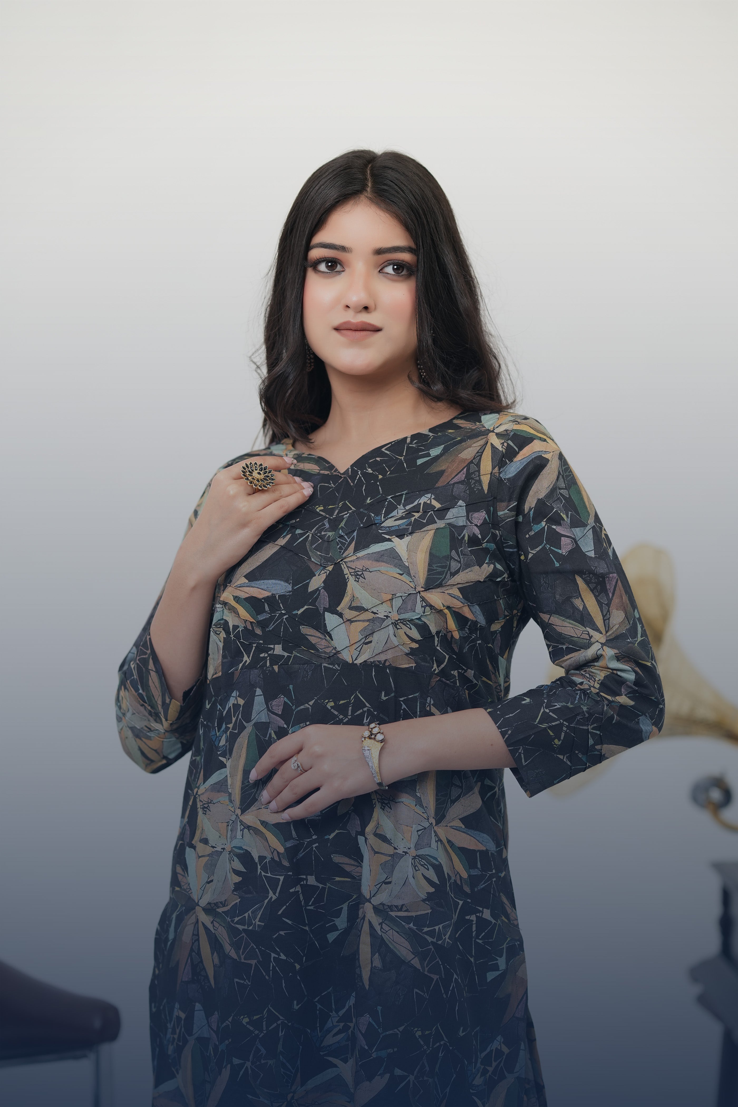 A woman wearing a Midnight Sonata black digital print kurta set by Simroz