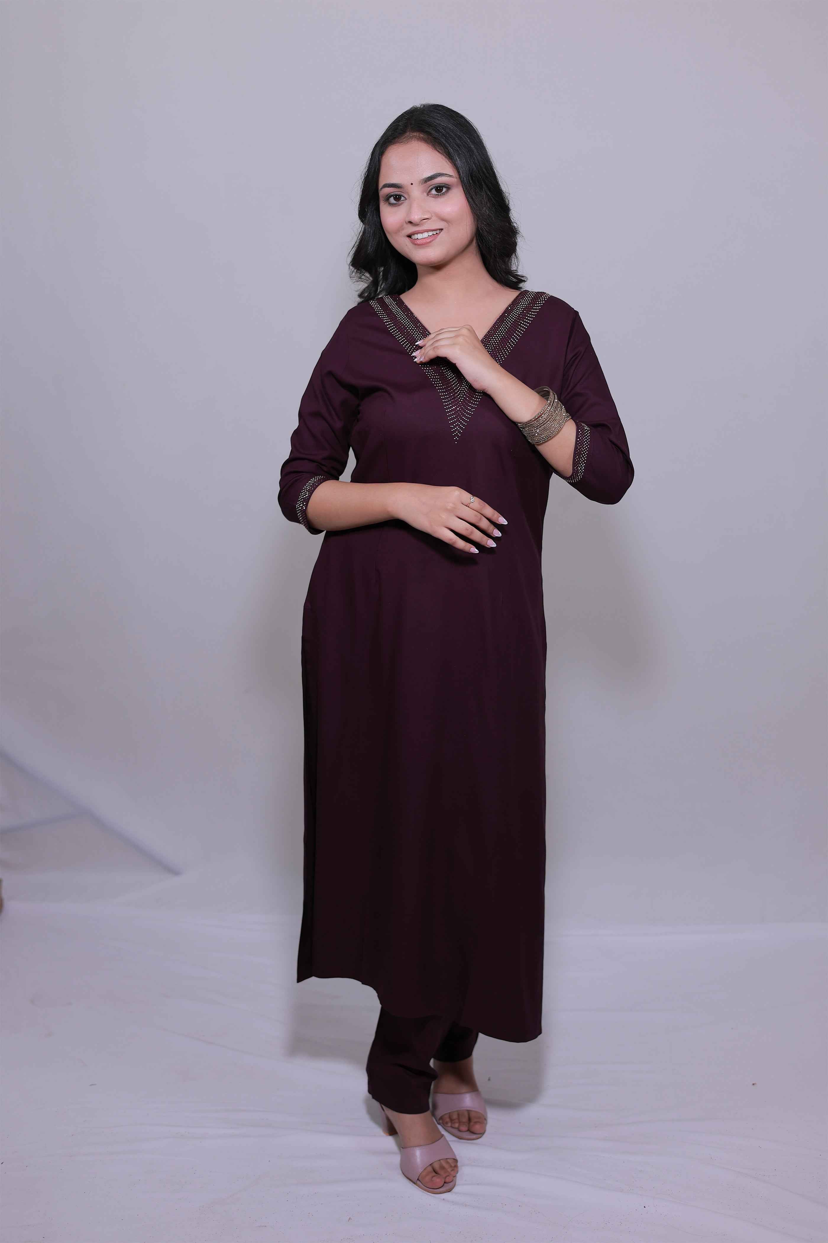 A woman wearing a Midnight Sonata black digital print kurta set by Simroz