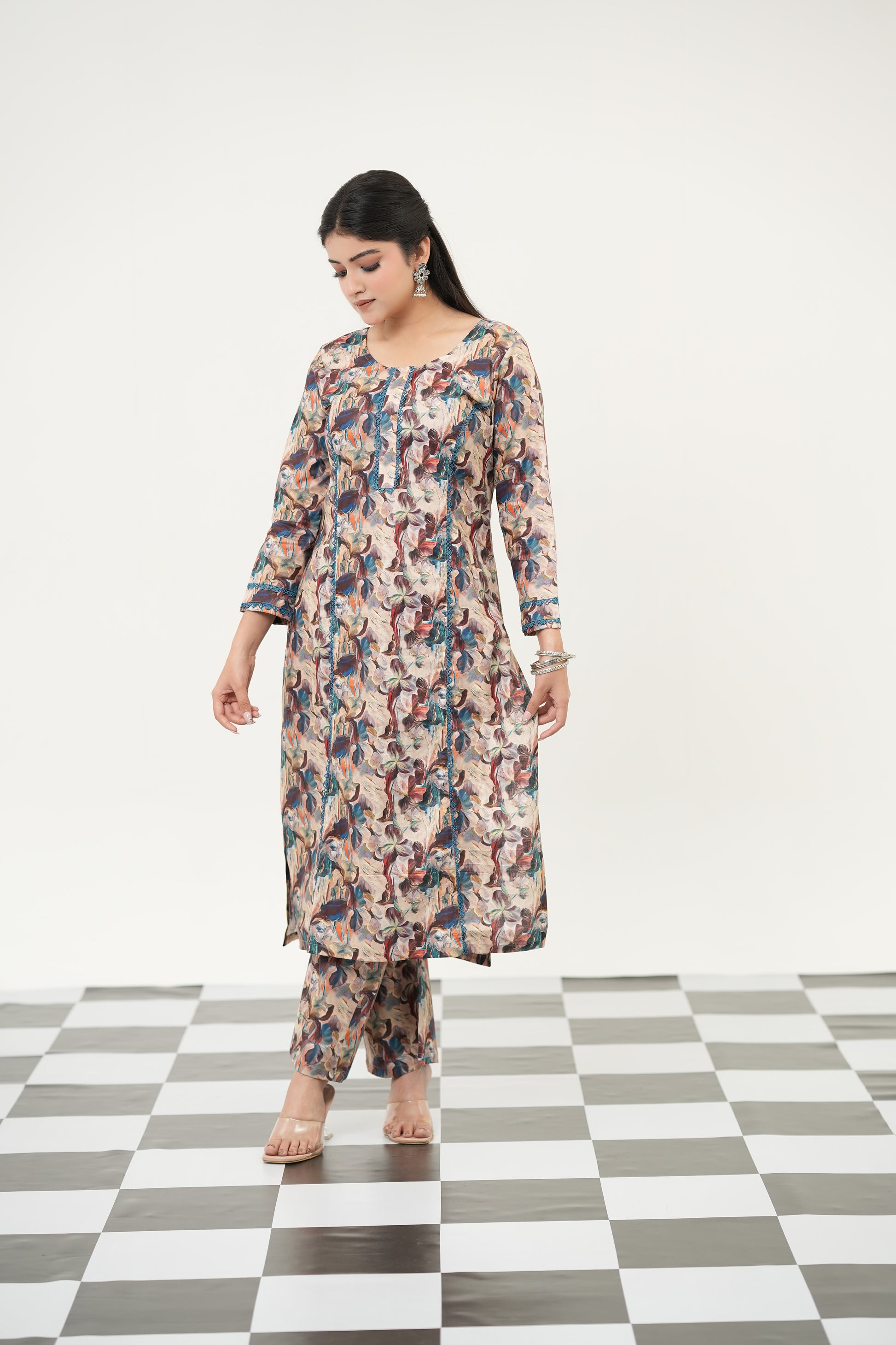 Stylish abstract printed kurta set for women by SIMROZ, featuring bold colors and premium summer comfort, full view front.