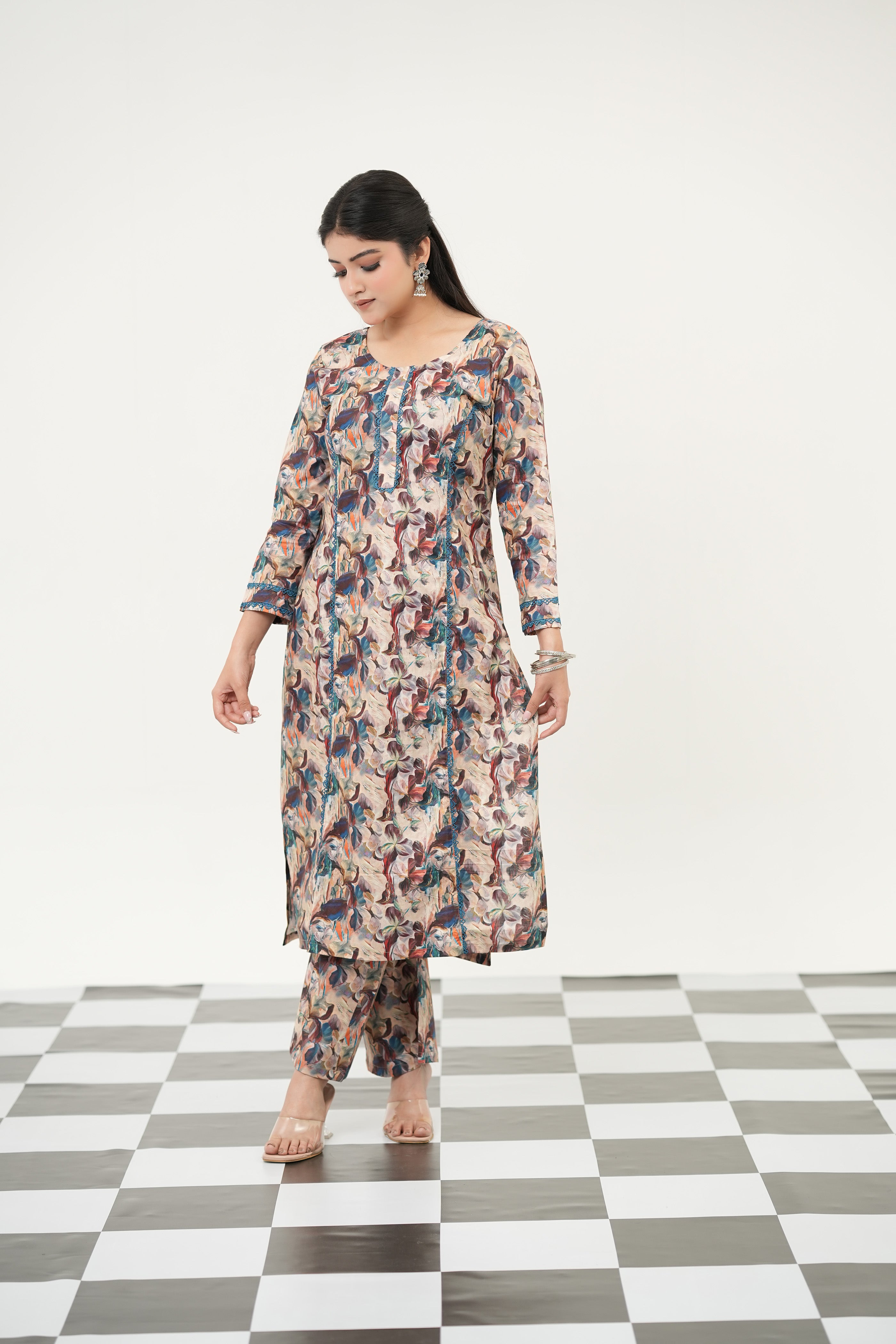 Stylish abstract printed kurta set for women by SIMROZ, featuring bold colors and premium summer comfort, full view front.