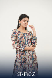 Abstract digital print kurta set with painterly floral motifs and delicate lacework by SIMROZ