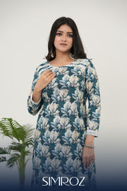 A model in Verdant Bloom digital print kurta set with teal floral and blush botanical patterns – SIMROZ