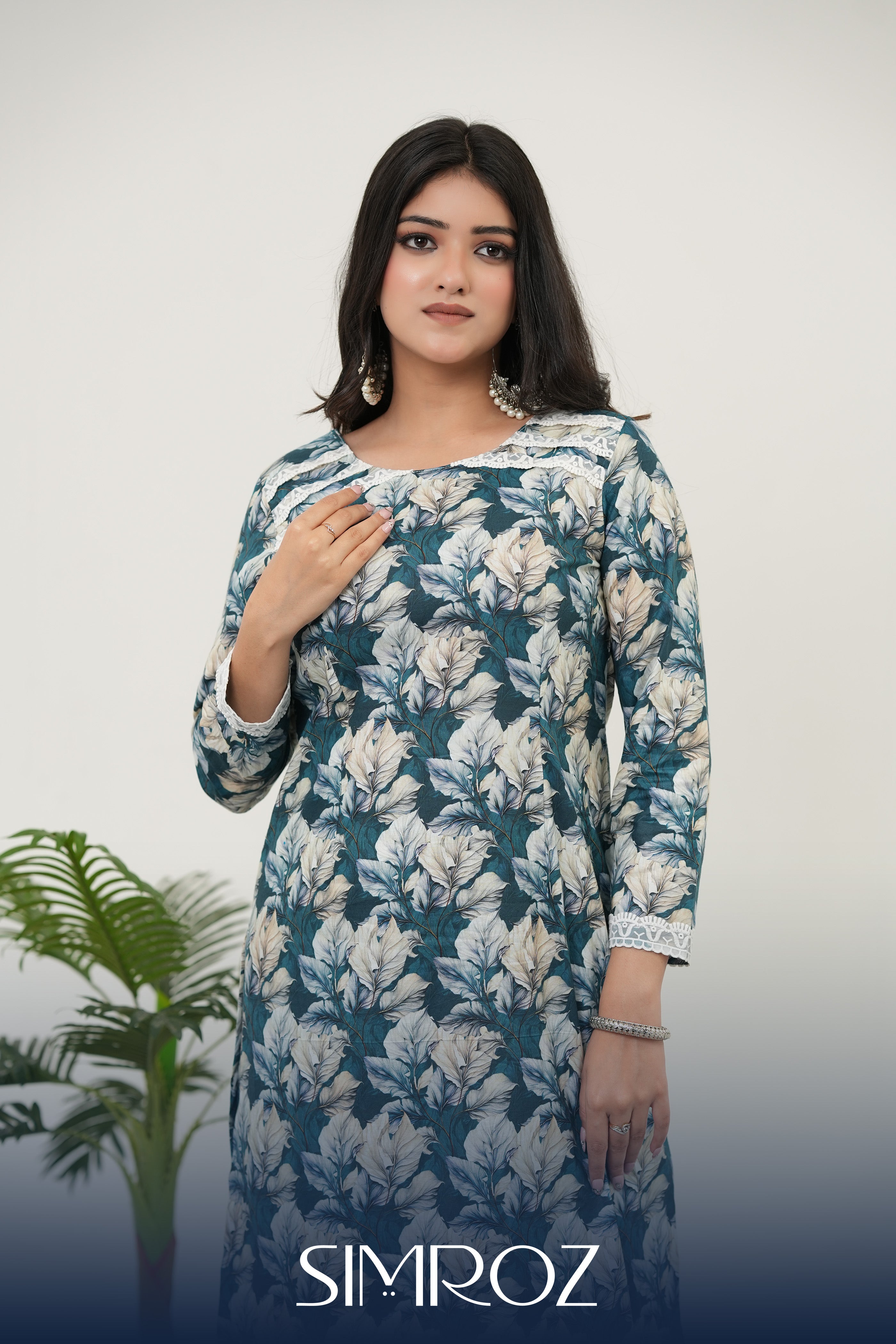 A model in Verdant Bloom digital print kurta set with teal floral and blush botanical patterns – SIMROZ