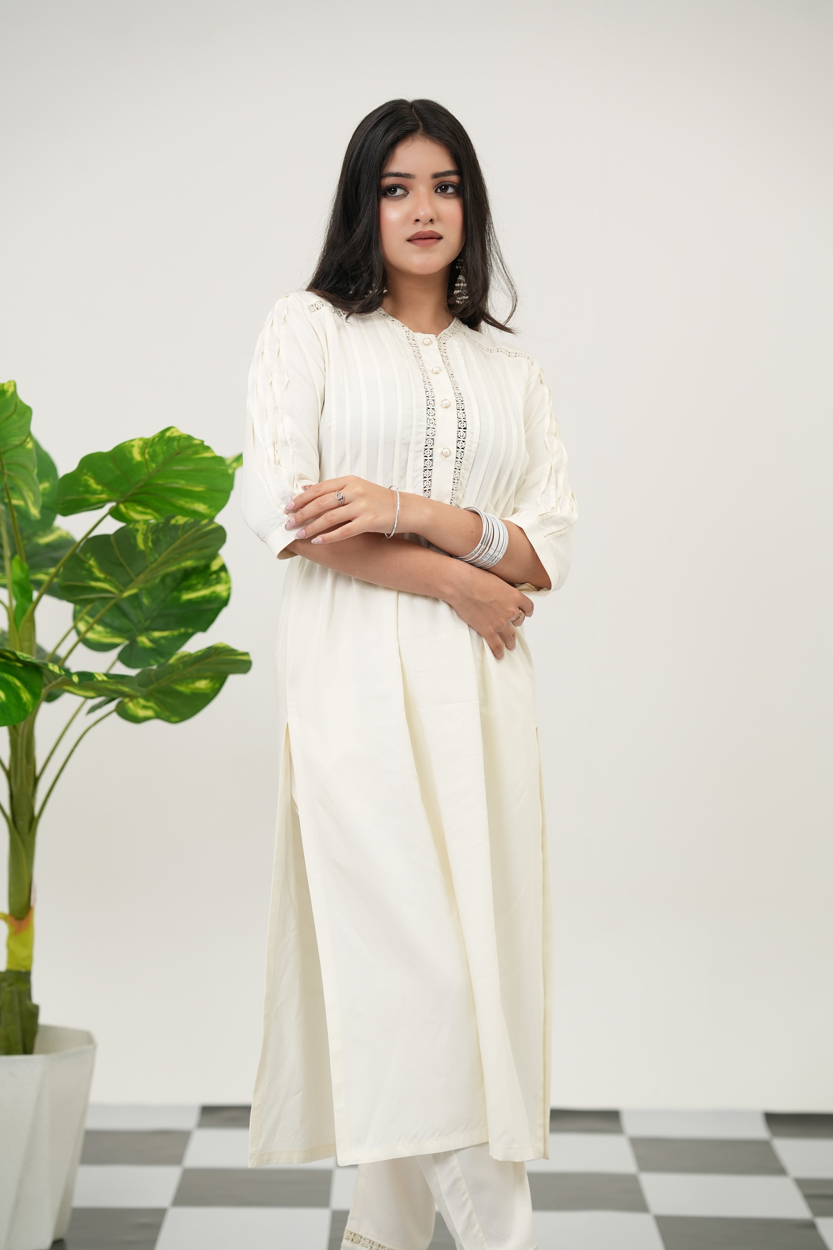 SIMROZ Summer Snow kurta set in off-white with lace embellishments, mirror accents, 3/4 sleeves, and straight fit.