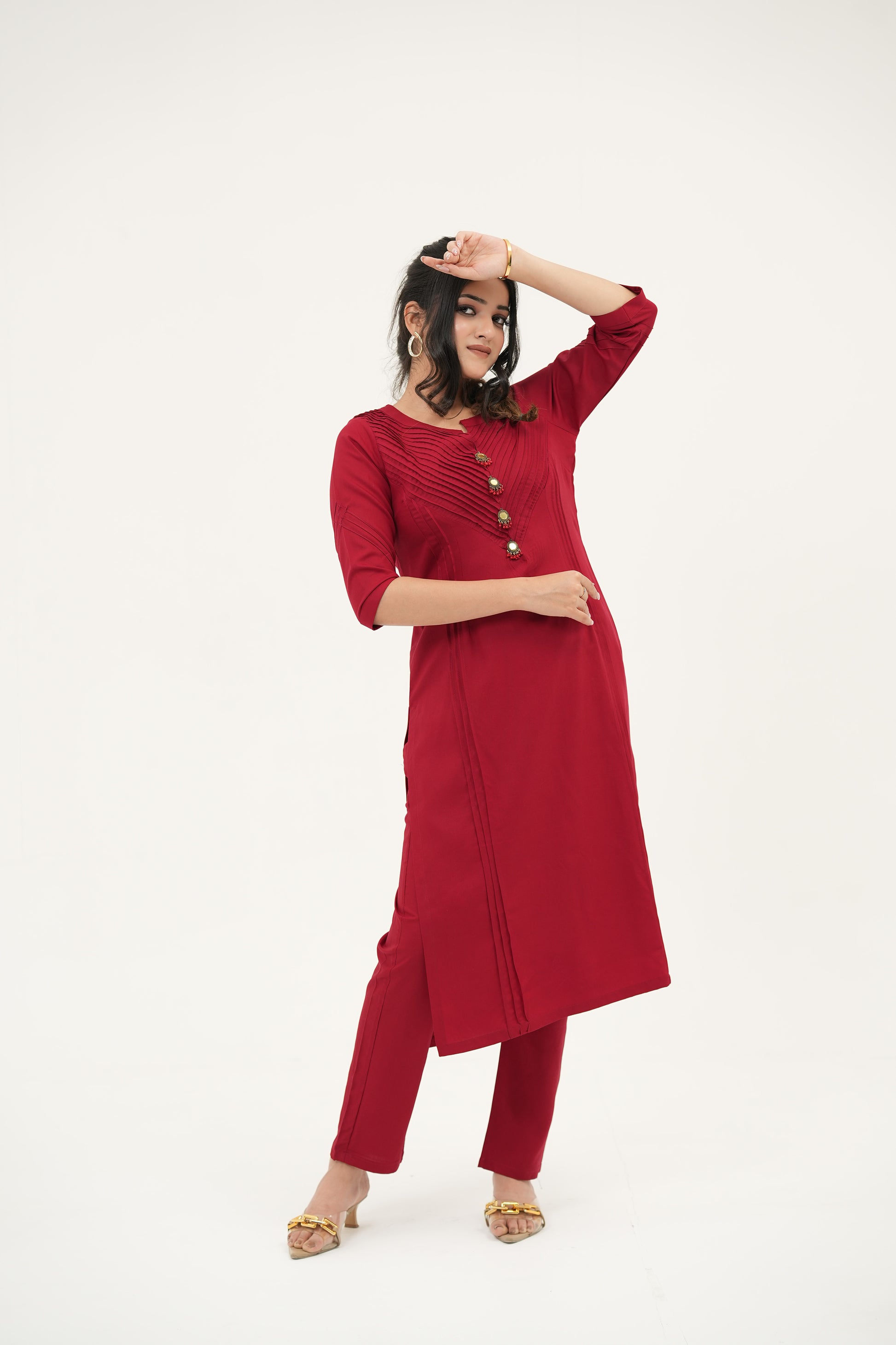 Crimson Radiance kurta set by SIMROZ in bold red, designed with pintuck detailing, unique handcrafted buttons, straight-fit comfort, and premium summer styling