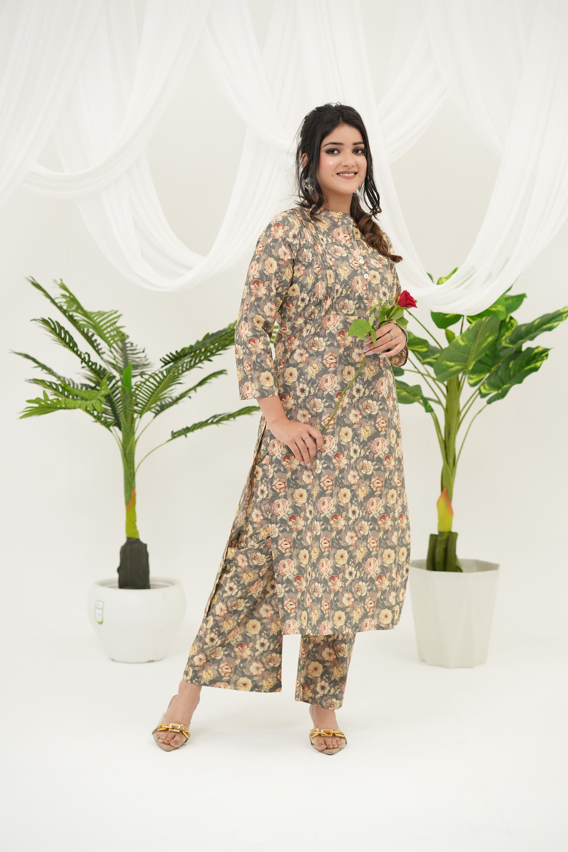 Grey-beige kurta set with pintuck detailing, ban collar neckline, and all-over floral digital print by SIMROZ