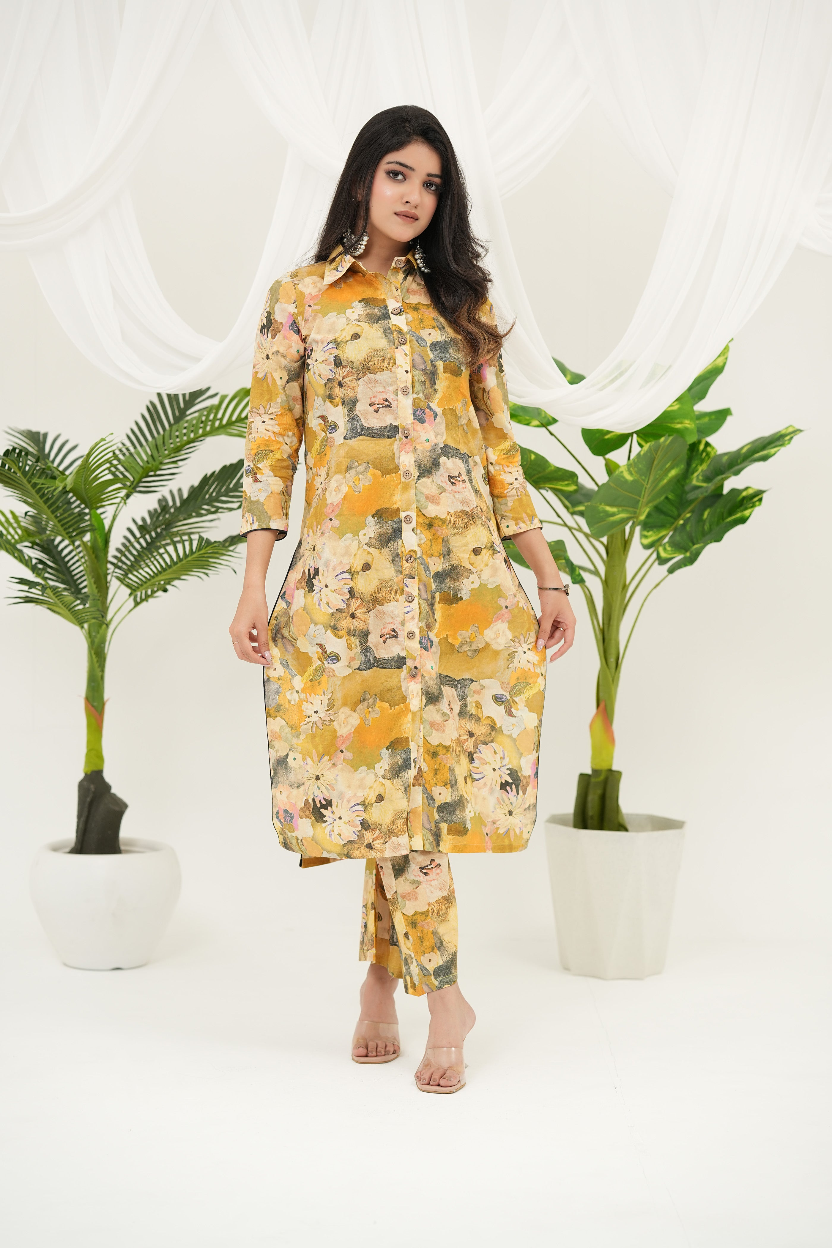 Designer yellow straight-fit kurta set with vibrant digital prints by Simroz, full front view, 3/4 sleeve style.