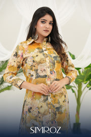 A woman wearing a Golden Meadow yellow digital print kurta set by Simroz.