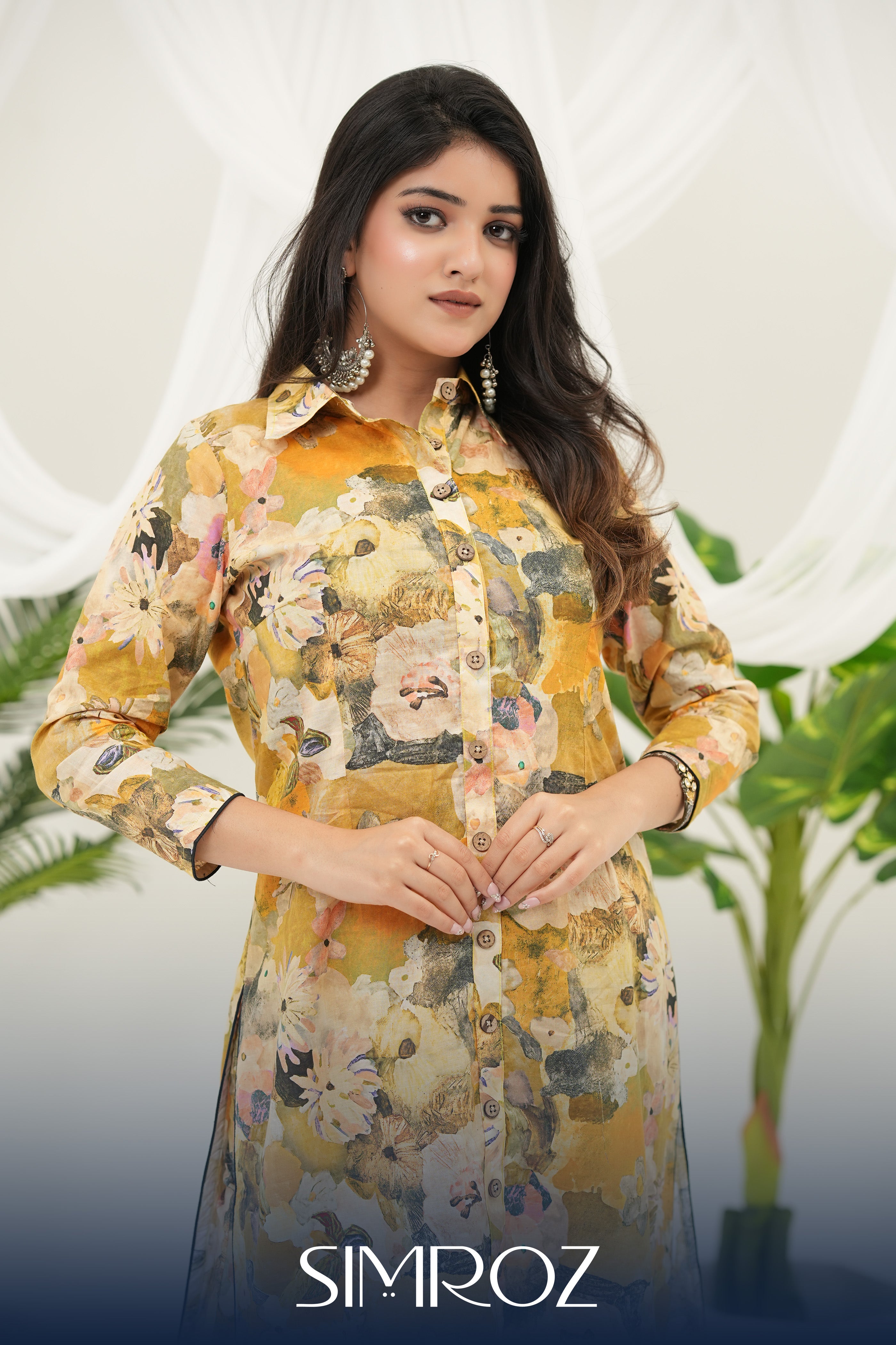 A woman wearing a Golden Meadow yellow digital print kurta set by Simroz.