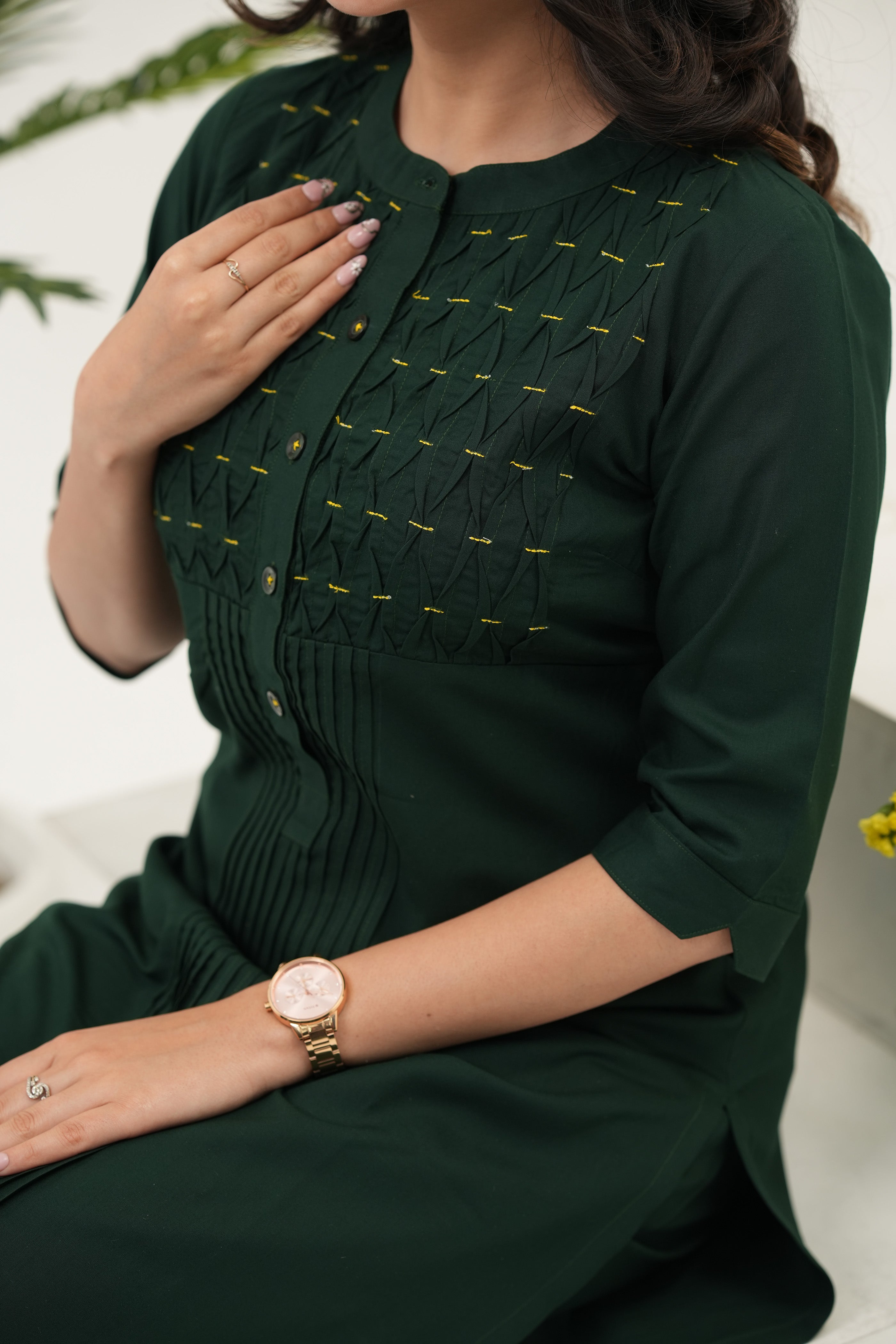 Emerald Weave kurta set by SIMROZ crafted in soft rayon viscose, highlighting a woven pintuck yoke with delicate bead accents and refined button placket, close-up view.