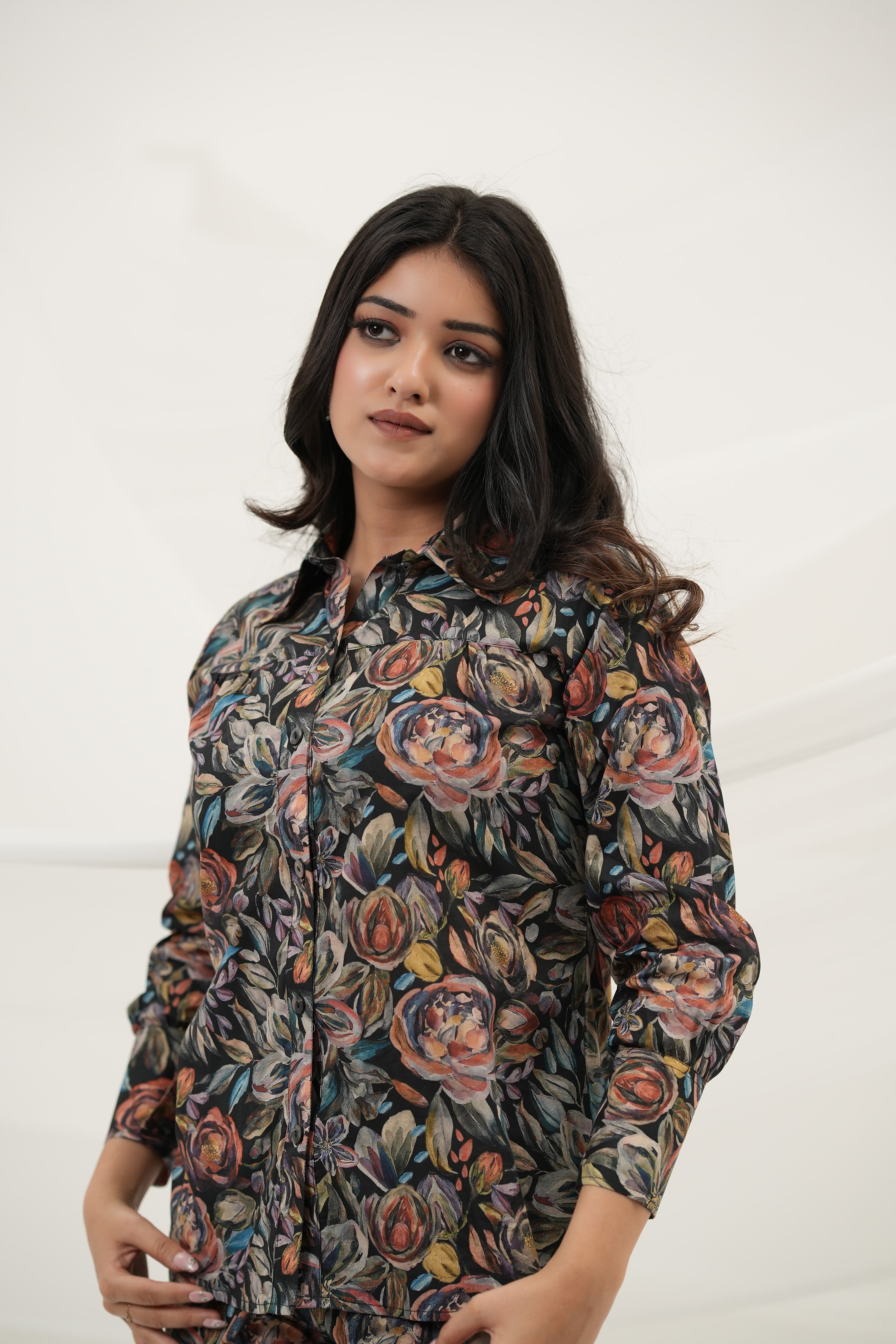 A woman wearing Black Multiflora Co-ord Set with pockets, front view - Simroz.