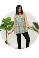 A woman wearing a Aqua Breeze Tie-Shoulder Top, Sleeve Less - Simroz