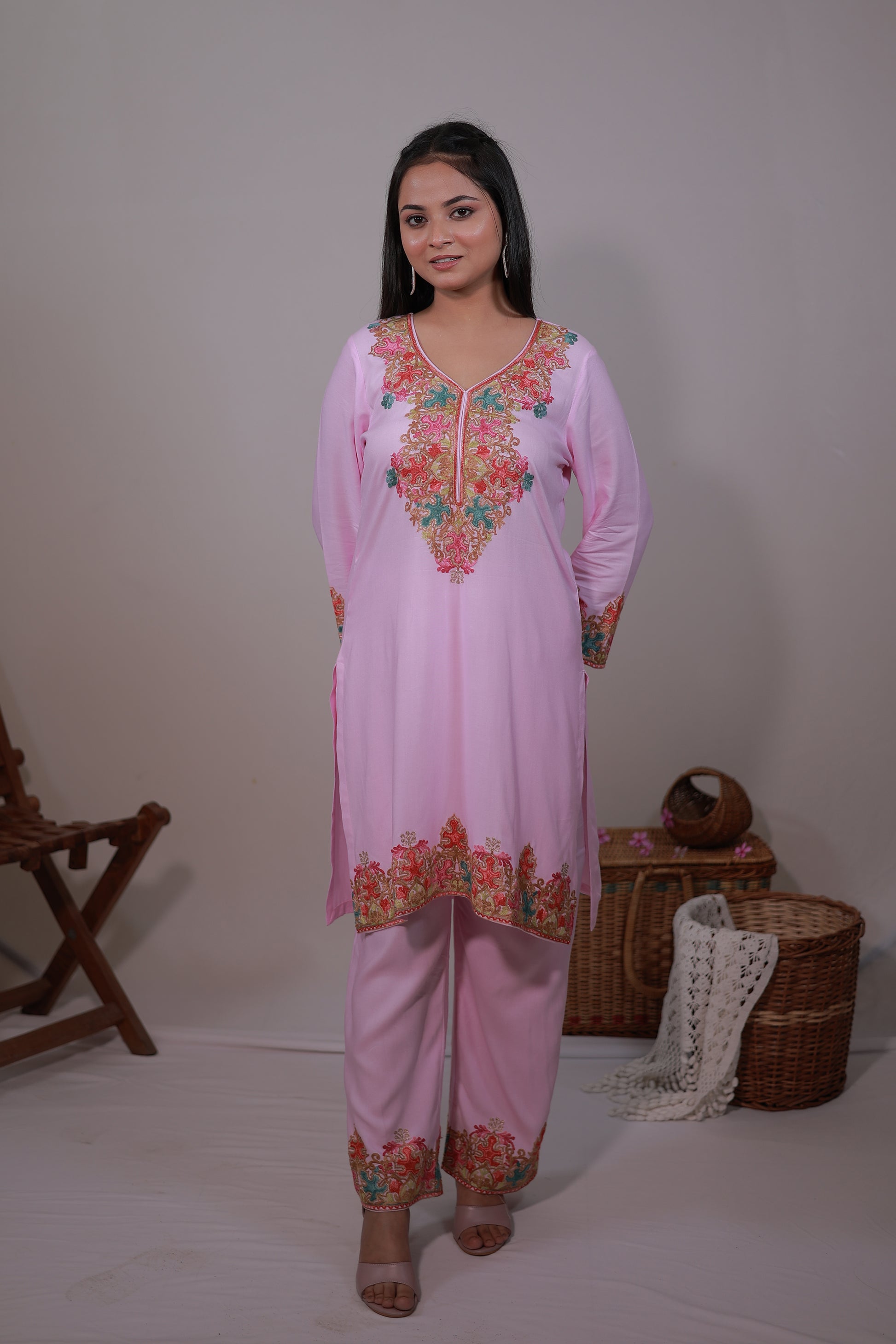 Lifestyle image of Pastel Pink Kashmiri embroidered Gul-e-Kashmir Kurta Set by Simroz, festive ethnic outfit for women