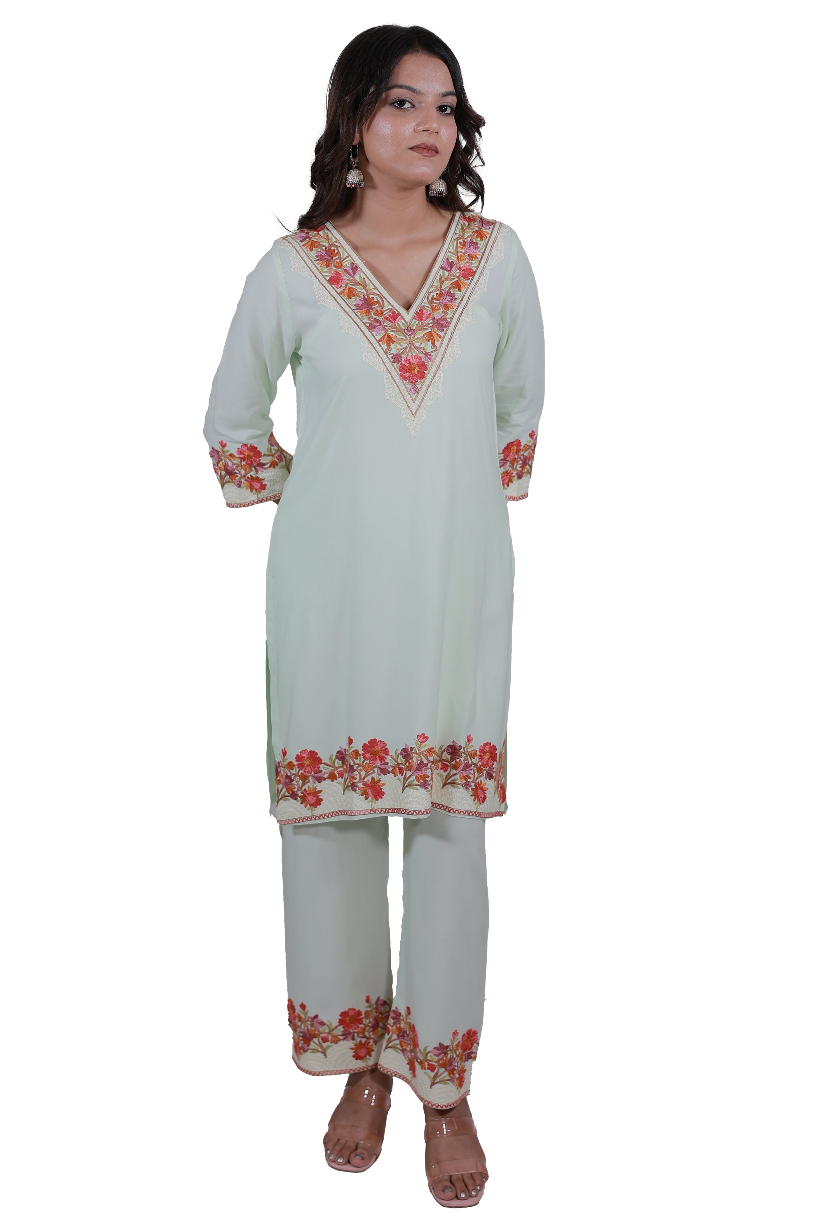 A woman wearing Simroz Bahaar-e-Gulmarg Kurta Set, Kashmiri Aari embroidery, Pastel Green – front view