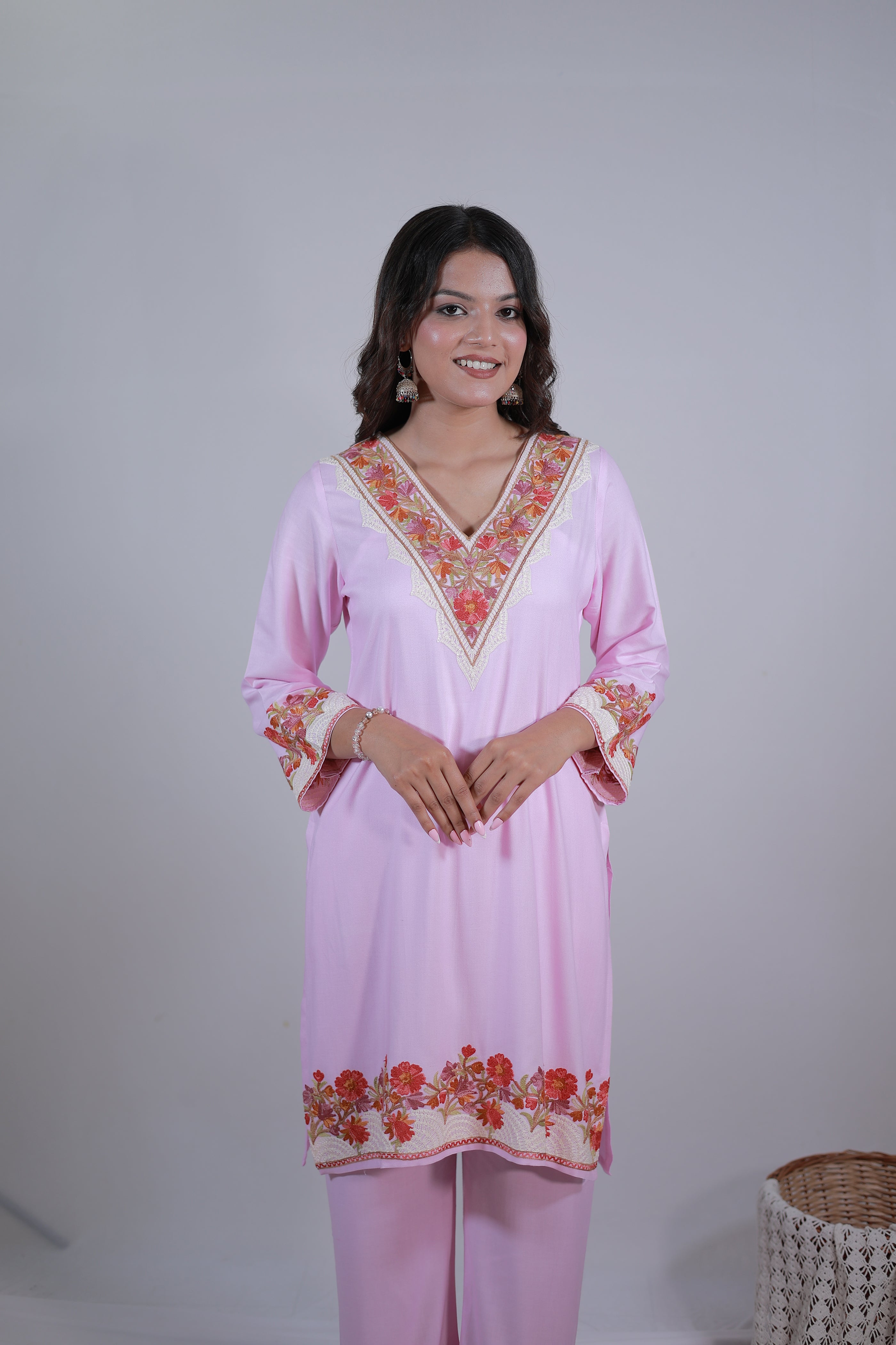 A woman wearing Simroz Bahaar-e-Gulmarg Kurta Set, Kashmiri Aari embroidery, Baby Pink – front view