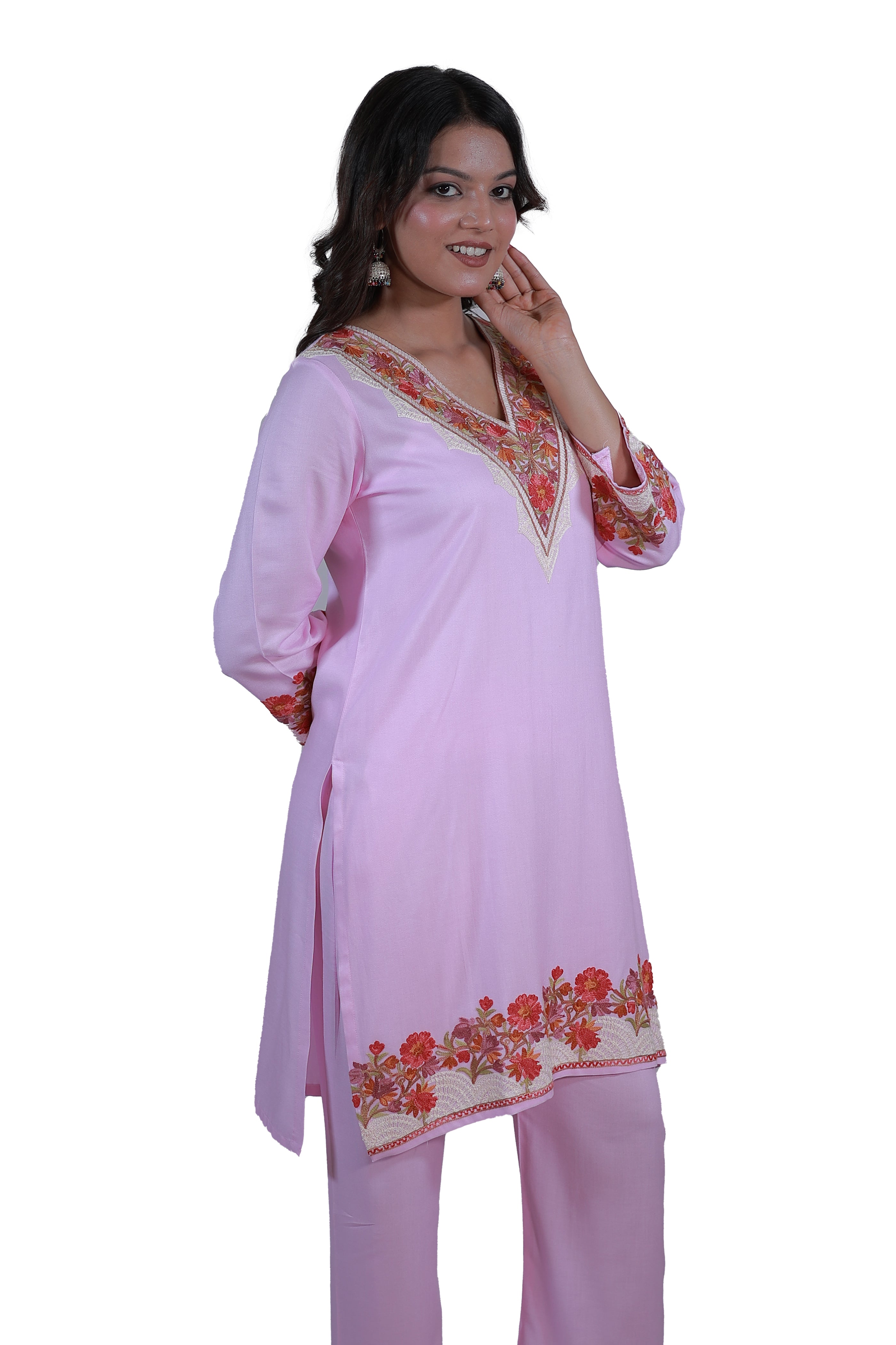 A woman wearing Simroz Bahaar-e-Gulmarg Kurta Set, Kashmiri Aari embroidery, Baby Pink – side view