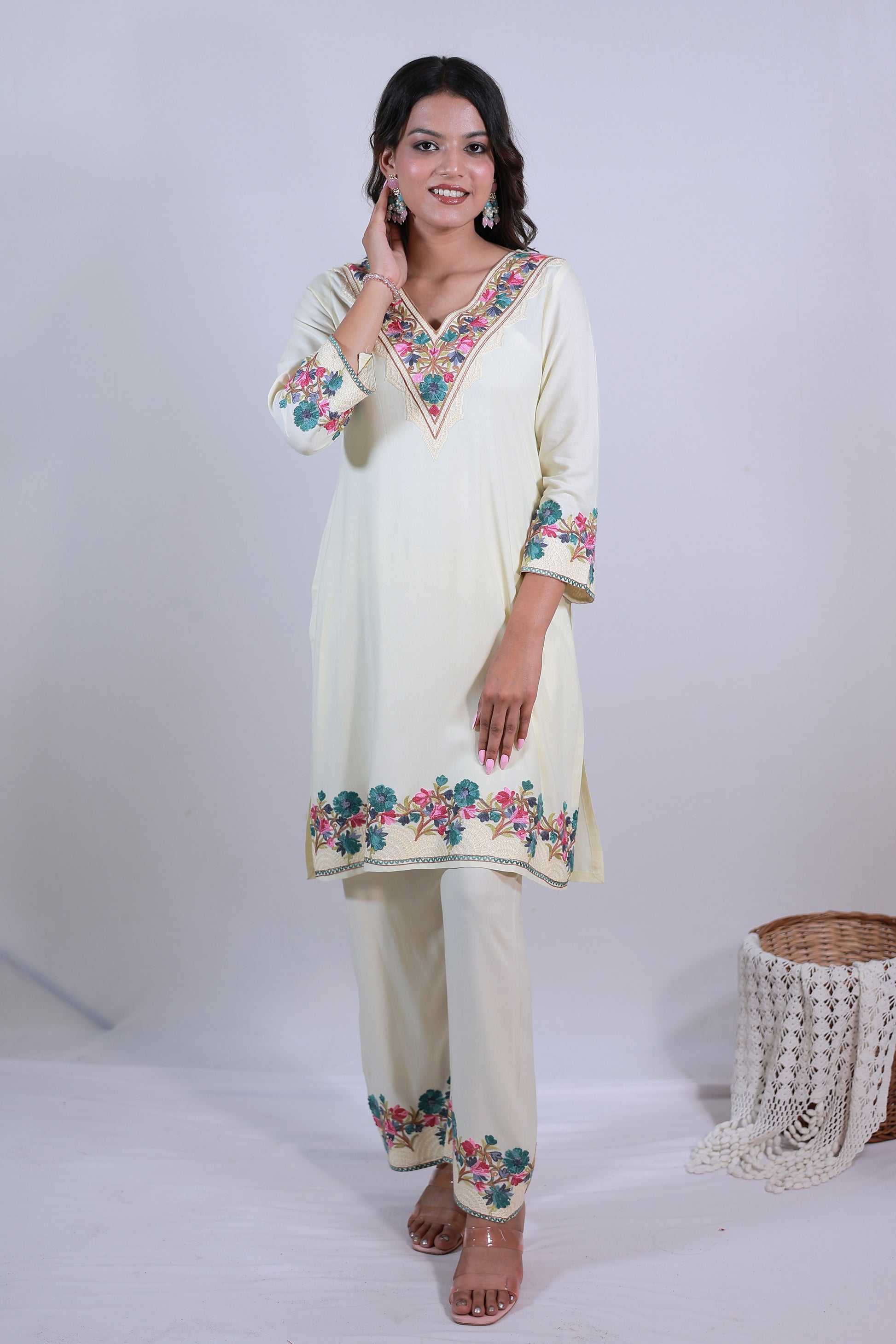 A woman wearing Simroz Bahaar-e-Gulmarg Kurta Set, Kashmiri Aari embroidery, Pastel Yellow – front view