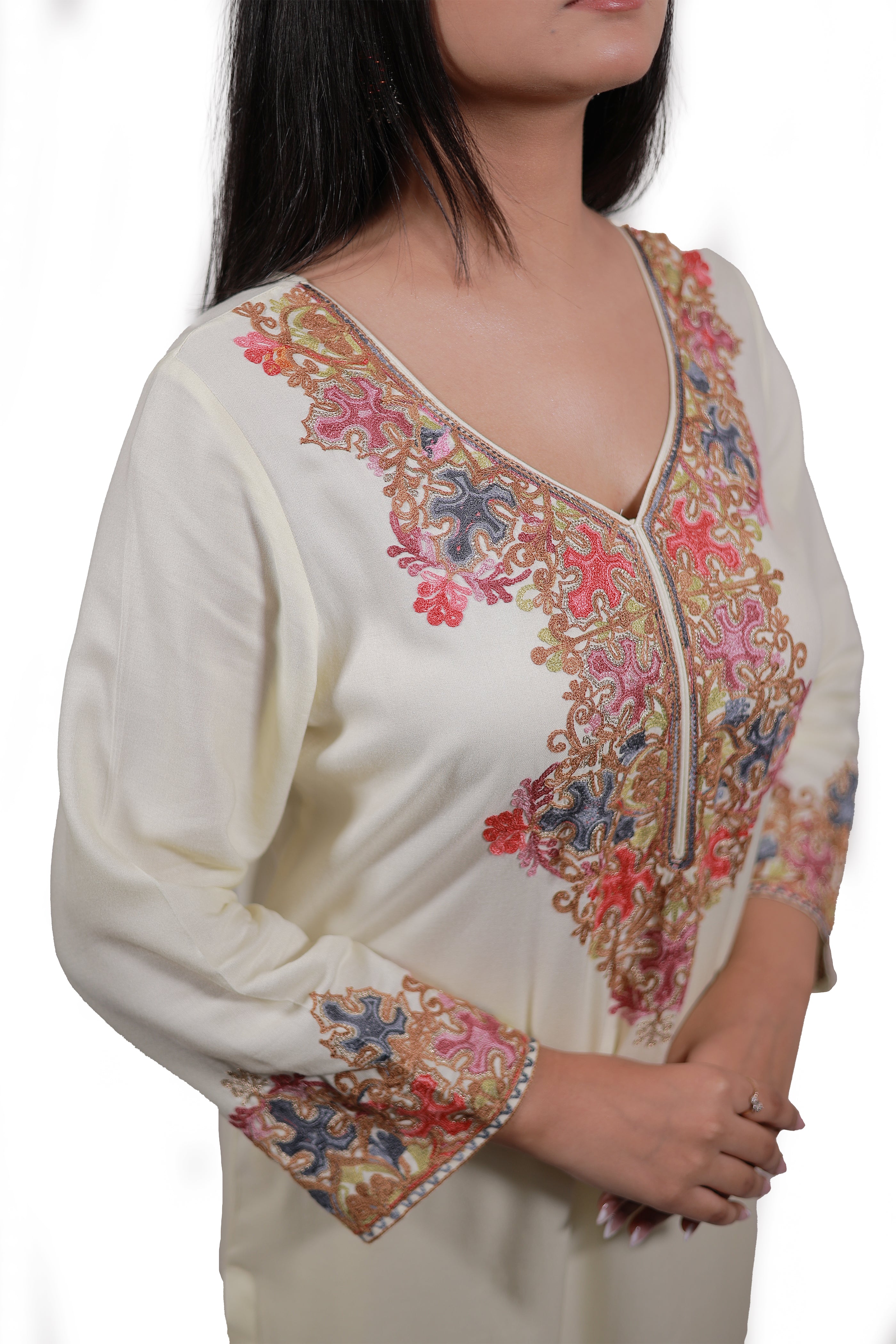Model wearing Simroz Gul-e-Kashmir Kurta Set in pastel yellow with intricate Kashmiri Aari embroidery, perfect for festive occasions