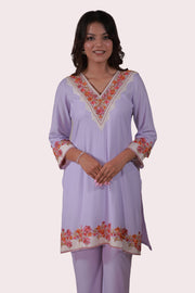 A woman wearing Simroz Bahaar-e-Gulmarg Kurta Set, Kashmiri Aari embroidery, Mauve color – front view