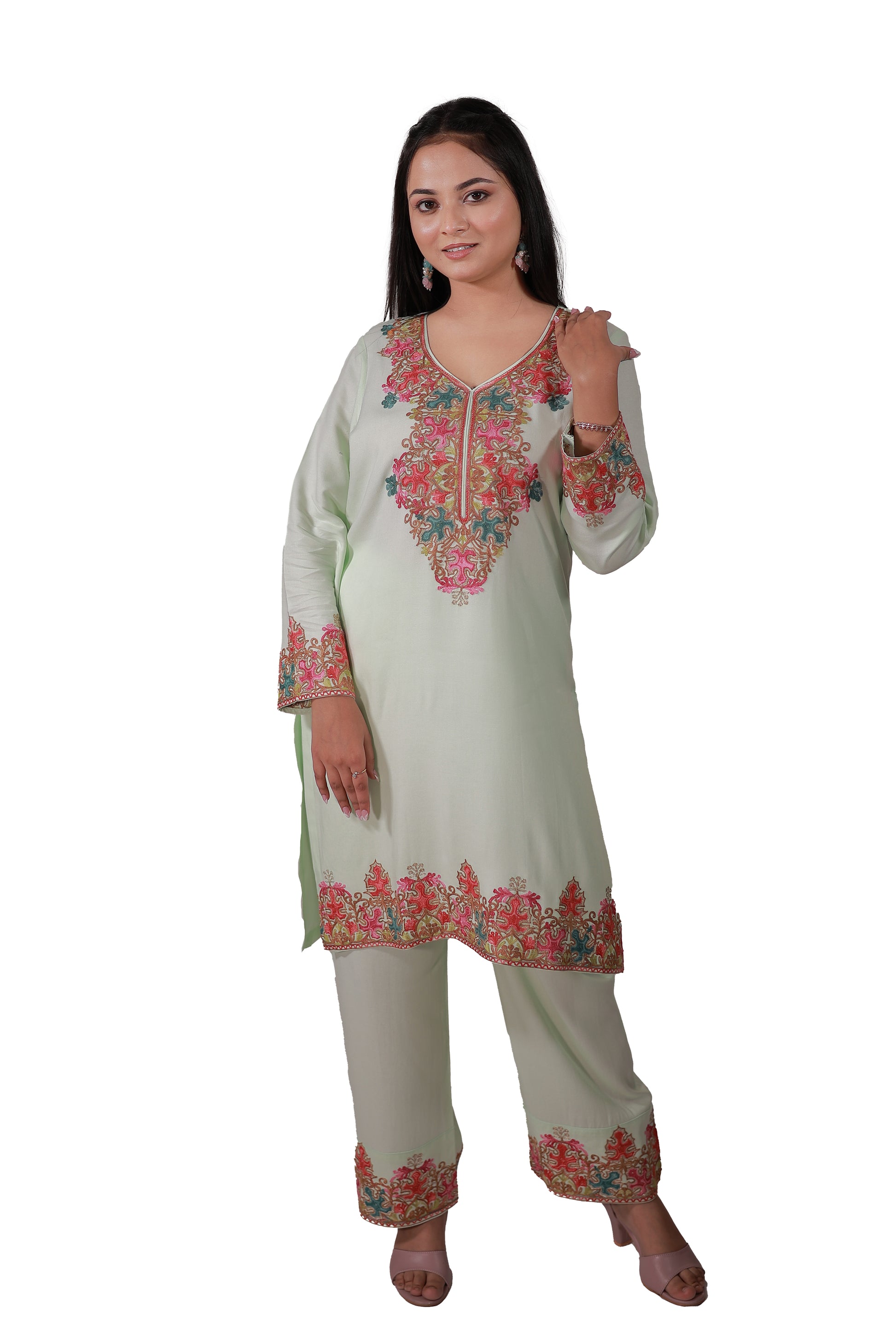 Lifestyle image of pastel green Simroz Gul-e-Kashmir Kurta Set with Kashmiri embroidery, festive ethnic wear for women