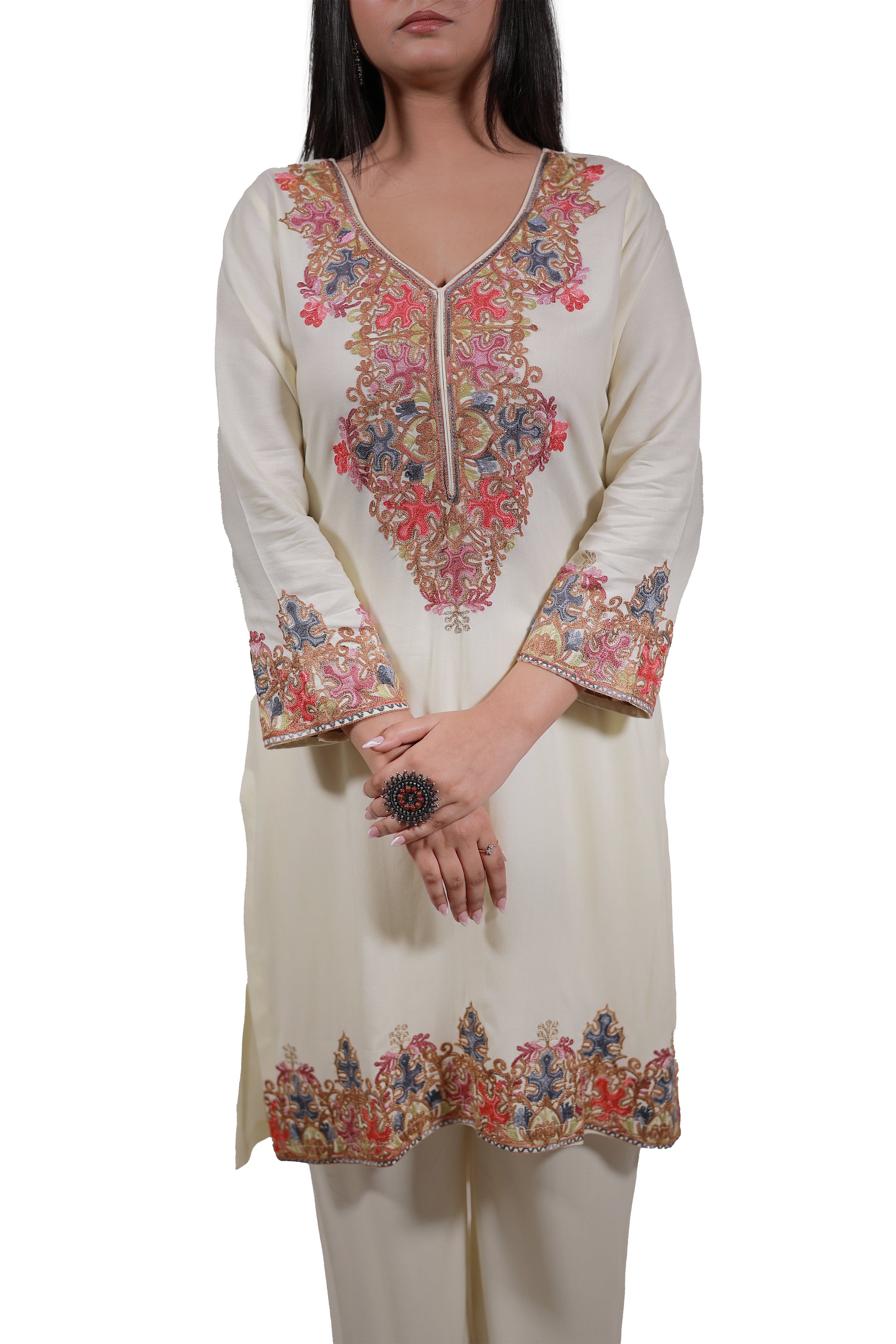 A woman wearing a Gul-e-Kashmir Kurta Set in pastel yellow, rayon viscose fabric with Kashmiri Aari embroidery, straight style festive outfit - Simroz